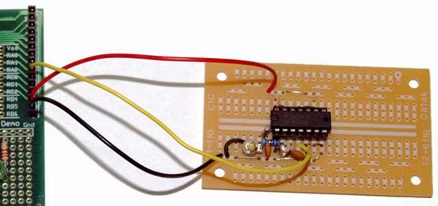 inverter acts as a buffer, isolating the oscillator stage from whatever circuitry it is attached to, to avoid overloading the oscillator, which would stop it oscillating.