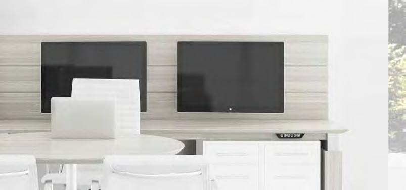 A 3-position button pad moves the complete Multi Position wall unit monitor, camera, worksurface and storage pedestals from 26" to 42"