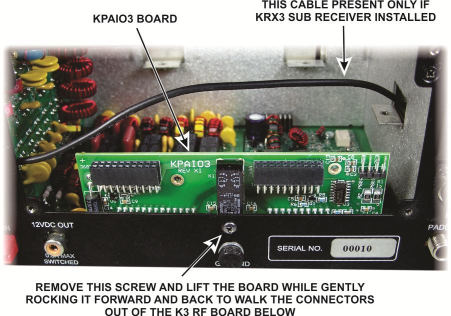 Remove the KPAIO3 interface board as shown in Figure 5. Figure 5. Removing the KPAIO3 Board. Remove the left side panel (Figure 6).