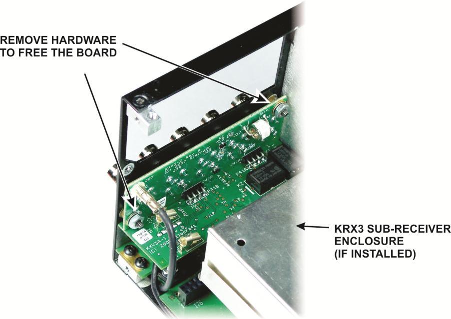 If the KXV3 board is installed, remove the screws, washers and nuts securing it to the rear panel. That will free a panel that surrounds the BNC connectors. Remove that panel as well.