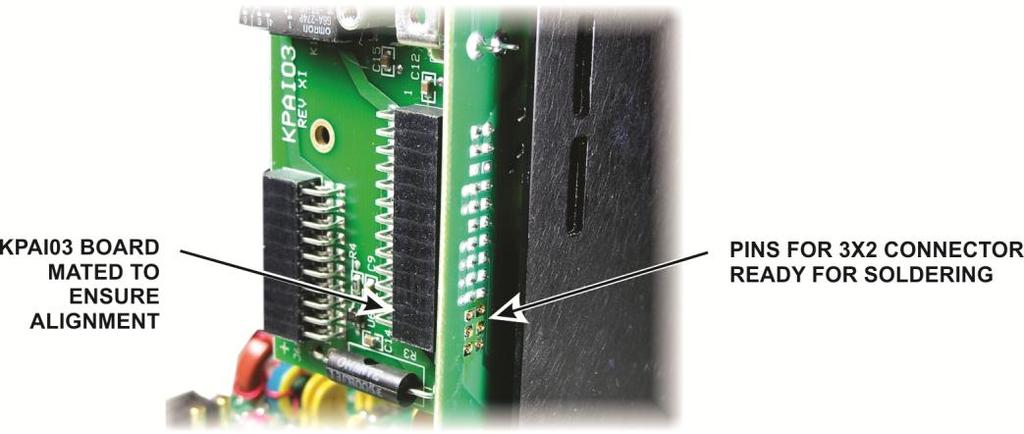 Use your de-soldering tool to clean the solder out of the pads and then insert the replacement 3X2 connector in the holes. Be sure the pad holes are clear so the pins fit without excess pressure.