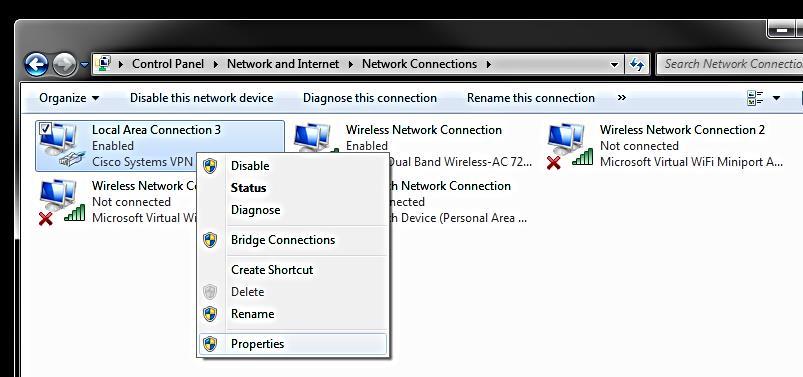 In Network and Sharing window, click Change Adapter Settings in the left panel.