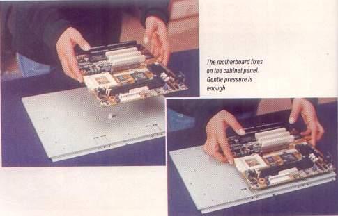 Place the casing panel on the table and gently fix the motherboard on it (Figure 2).