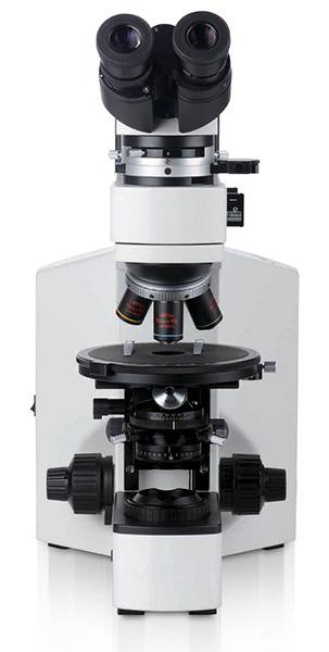 Intermediate device for professional conscopic observation has internal Bertrand lens, analyzer, and slot for full λ plate, / λ plate and quartz wedge.