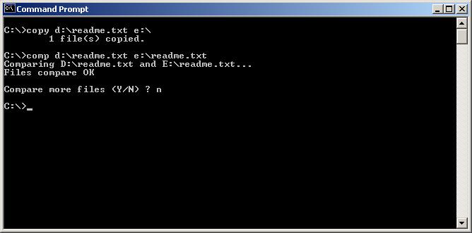 6. Run the following commands in the Command Prompt window: copy d:\readme.txt e:\ comp d:\readme.txt e:\readme.txt For this example, the CD-ROM drive is d:\ and the USB drive is e:\.