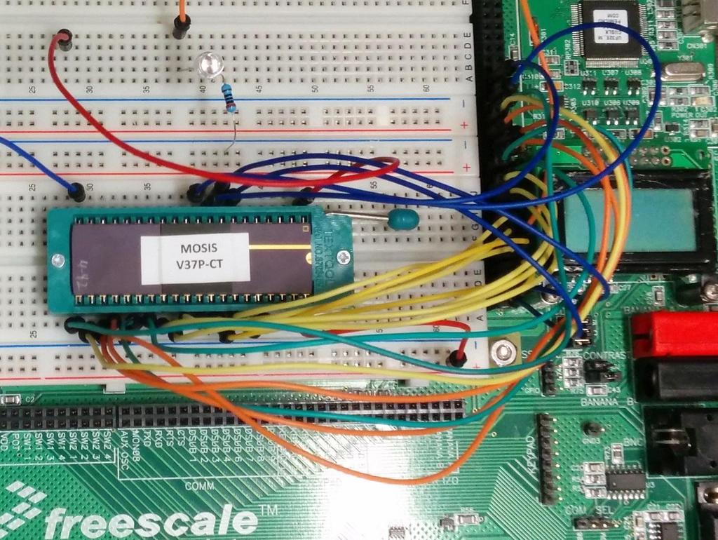 Chip placed on the tester breadboard Chip Testing Visual Inspection All of the received chips passed visual inspection, no flaws detected.