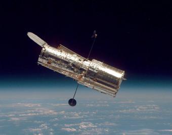 On-Orbit Servicing (OOS) and space debris: Human OOS: - HST Hubble: Original cost: