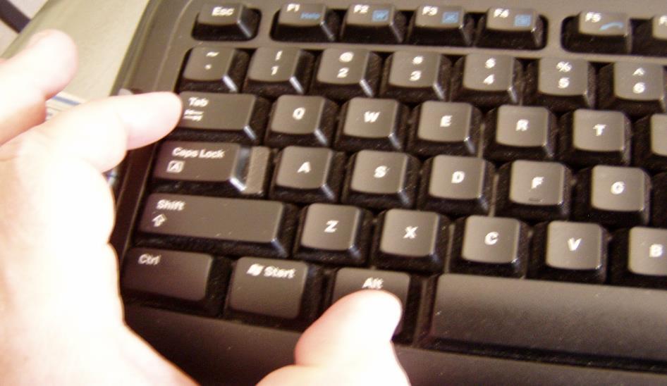 To use this option; press and hold the Alt key on your keyboard, and then tap the Tab key to cycle through the windows.