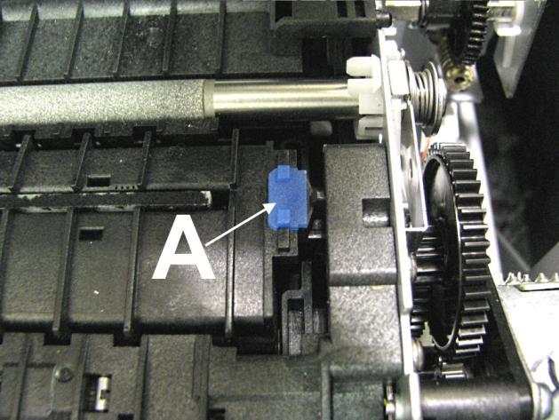SECTION 2 INSTALLING THE PRINTER 4. Carefully pull out the right-hand Spacer (smaller) in the hole in the Service Station Platen [A]. 5.