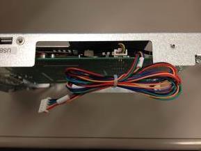 NOTE: FOR US ATM INSTALLATIONS ONLY - The new ADA interface cable is connected at one end to the top of the Main Control Board.