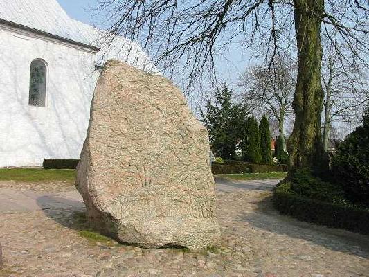 and the real rune stone Located in Jelling, Denmark, erected by King Harald Blåtand in