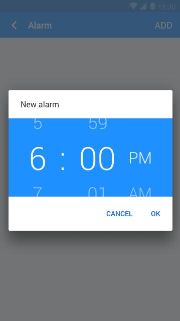 Figure 19: Scroll vertically through hour, minute and AM/PM to set the alarm time, then tap OK.
