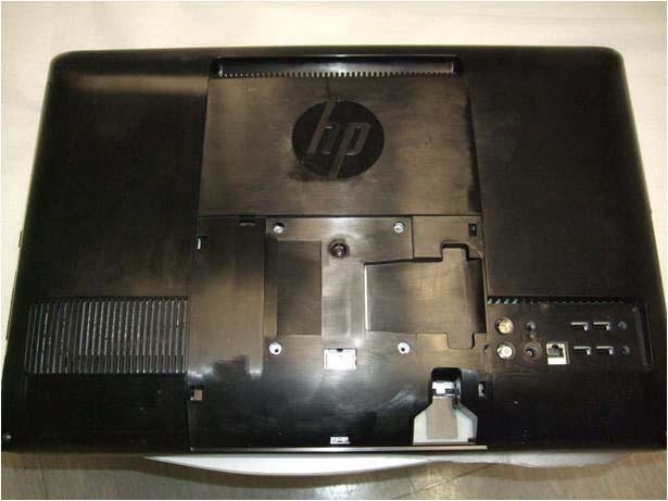 Removing the wall-mounting hardware Prepare your HP TouchSmart PC for removal from the wall-mounting device. 1.