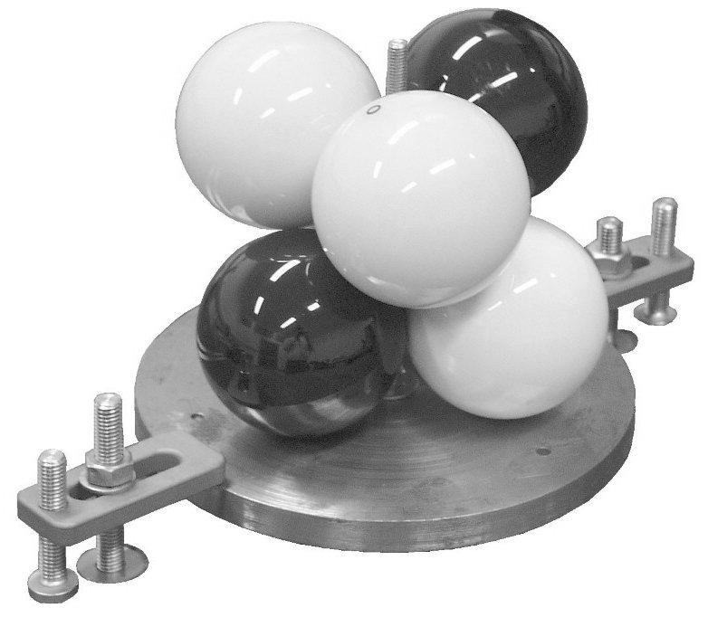 produces a solid connection with zero degrees of freedom, enabling the mounting and dismounting of the artefact in order to easily measure lower set and upper set of spheres (always mounted in the