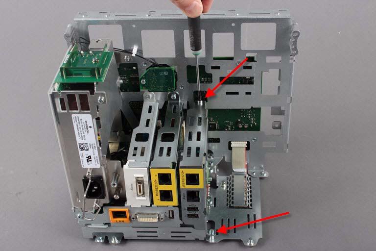 11 Insert the advanced interface board into its slot and secure it with the two