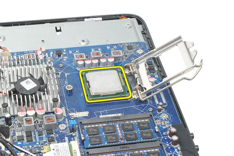 Installing The Processor 1. Insert the processor into the processor socket. Ensure the processor is properly seated. 2. Lower the processor cover. 3.