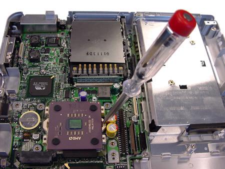 CPU Below is explained how you should remove the CPU: a. Unlock the CPU with a flatbed screwdriver. Fig.