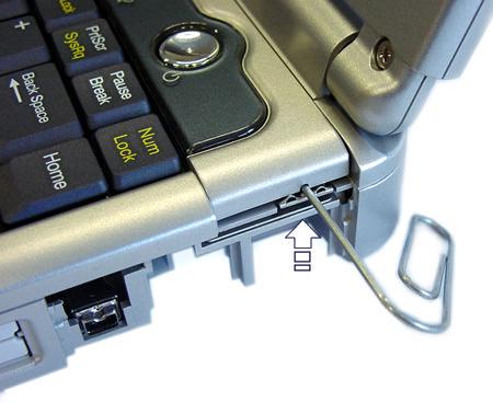 Fig. 4: RJ-11 connector. 5. Indicator Cover and Keyboard Remove the keyboard as follows: a. Use a thick paperclip to unlock the indicator cove. b. Slide indicator cover to the left to remove it. c. Disconnect the indicator board.
