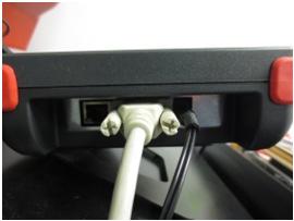 Attach the 9-pin connector cable to the port on the LEFT SIDE of the console AND to the back of the machine.