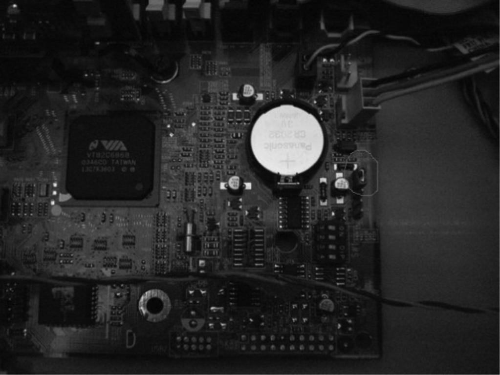 Hacking Windows OS 7 Figure 1.2 CMOS jumper on the motherboard to reset the BIOS password.