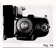 As you advance the Film Advance Lever, the Film Rewind Knob rotates indicating that the film is properly advancing. (Fig.