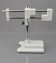 The body of the microscope is composed of the base and arm that comes with your unit, the focusing rack, and the head lock screw.