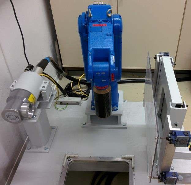 Fig. 1. Experimental Robot-CT setup. The industrial robot used for this paper is a YASKAWA MOTOMAN MH5, a six-axis industrial robot with a payload of 5kg. Its repeatability is listed at ±0.
