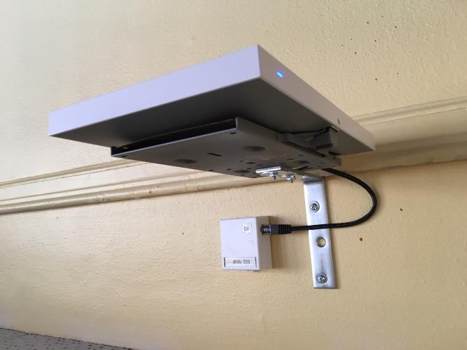 Access Point is mounted to face classroom floor Meraki MR4 Wall Mounting Parts List: A.