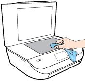 Before cleaning the printer, turn the printer off by pressing (the Power button) and unplugging the power cord from the electrical socket. 1. Lift the scanner lid. 2.