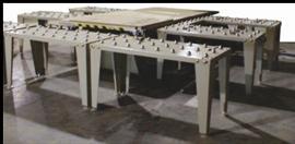 Integrated Pop-Up Roller Ball System Built right into the machining table, these roller balls raise and lower to facilitate material transfer, which