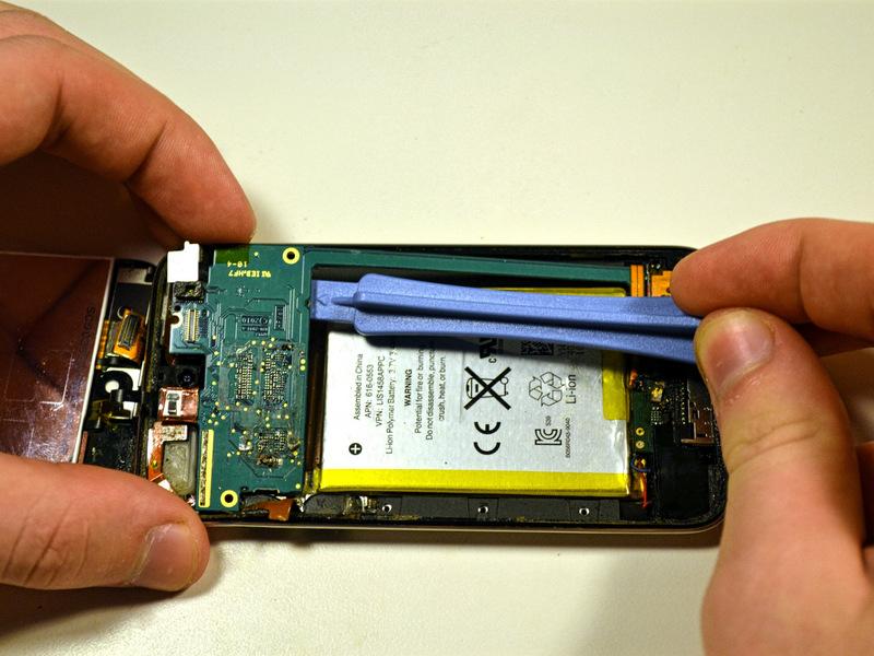 a cell phone prying tool to slowly pry the logic board straight up.