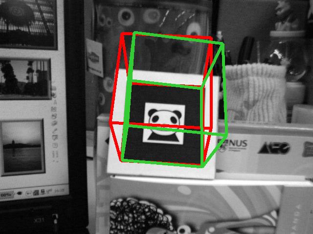 Resulting images of overlaying cubes by ARToolkit and our
