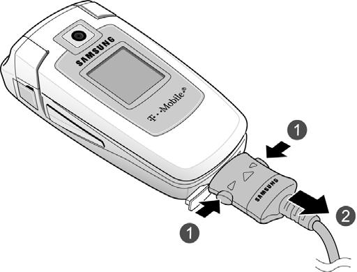 With the battery installed, plug the connector of the travel adapter into the jack on the bottom of the phone.
