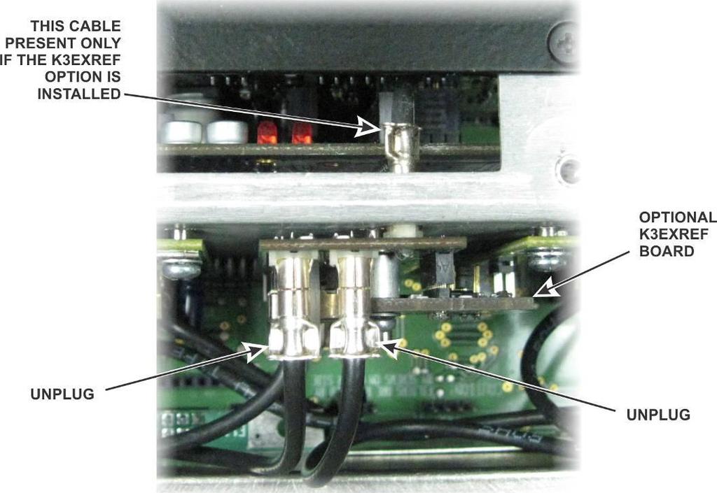 KREF3 Location Behind Front Panel Shield. Removing and Replacing the KREF3 Board Unplug the TMP cables leading to the connectors at the top of the KREF3 board (see Figure 5).