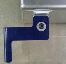 Mount the lower control box bracket to the lower left tab of the control box with two flat washers, 1 button head screw,