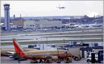Chicago Midway International Airport 4 runways 14 airline carriers 1 terminal /