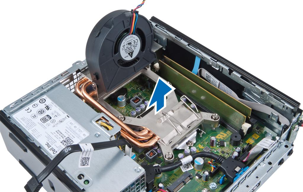 Lay the assembly with the fan facing downward, and with the thermal grease facing upward. Installing the Heat Sink 1. Place the heat sink into the chassis. 2.