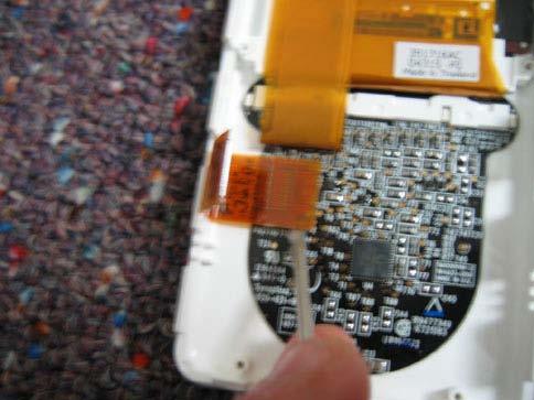 TouchWheel Cable Removal Before proceeding, first remove: Hard Drive Battery Logic Board To remove the TouchWheel cable,