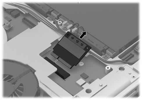 3. Remove the WLAN module by pulling the module away from the slot at an angle.