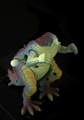 Examples of plenoptic image editing operations applied to photographs of a dinosaur toy.