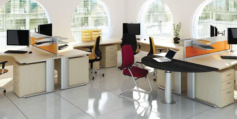 Symmetrical Desking Symmetrical desks offer the user additional working space with ergonomic benefits. Shown with optional acrylic dividing screens and meeting extension.