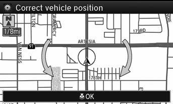 Press u. 4. Rotate i to position the arrowhead in the correct direction the vehicle is facing. 5. Press u to select OK.