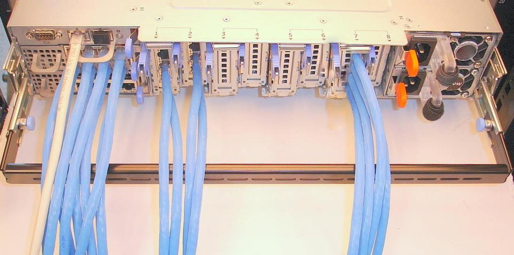 cables to the rear of the system and verify that all