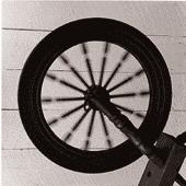 At 1/30, the blur is less evident (center); a relatively fast shutter speed of 1/250 (right) freezes the wheel s motion entirely.