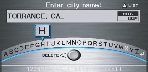 By Voice Control: Say City on the Find intersection by screen, and the display changes to the Say city name screen. Say the city name and searching will begin.