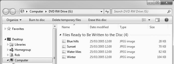 CDs & DVDs: Easily Share Documents and Photos C 204 / 7 want to copy to the disc, for example, by opening the Start menu and clicking Documents or Pictures.