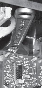 Revision B.006 Figure 3-16. Use a wrench to hold elbow fitting tight inside the control unit.