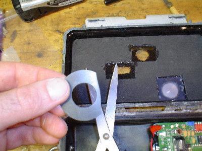 Next we need to cut one of the rubber washers you received with your camera kit to make a seal to mask off