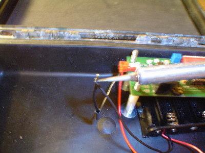 Solder the black wire from your power cable to the black wire of the battery holder. Figure 18 Lastly plug in the 2.