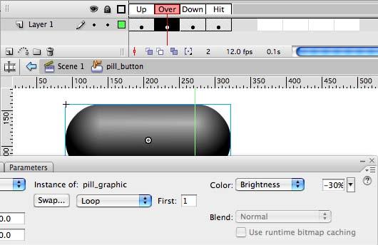 9 In the Over frame, select the instance of pill_graphic and adjust its Color settings in the Property Inspector. Set Color to Brightness and make the value 30% (see below).